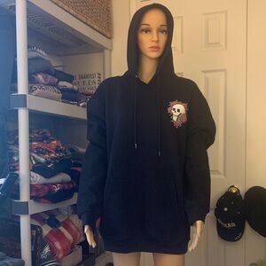 Brand new with tags LA Black Hoodie with Skull and Rose Design. Size L
